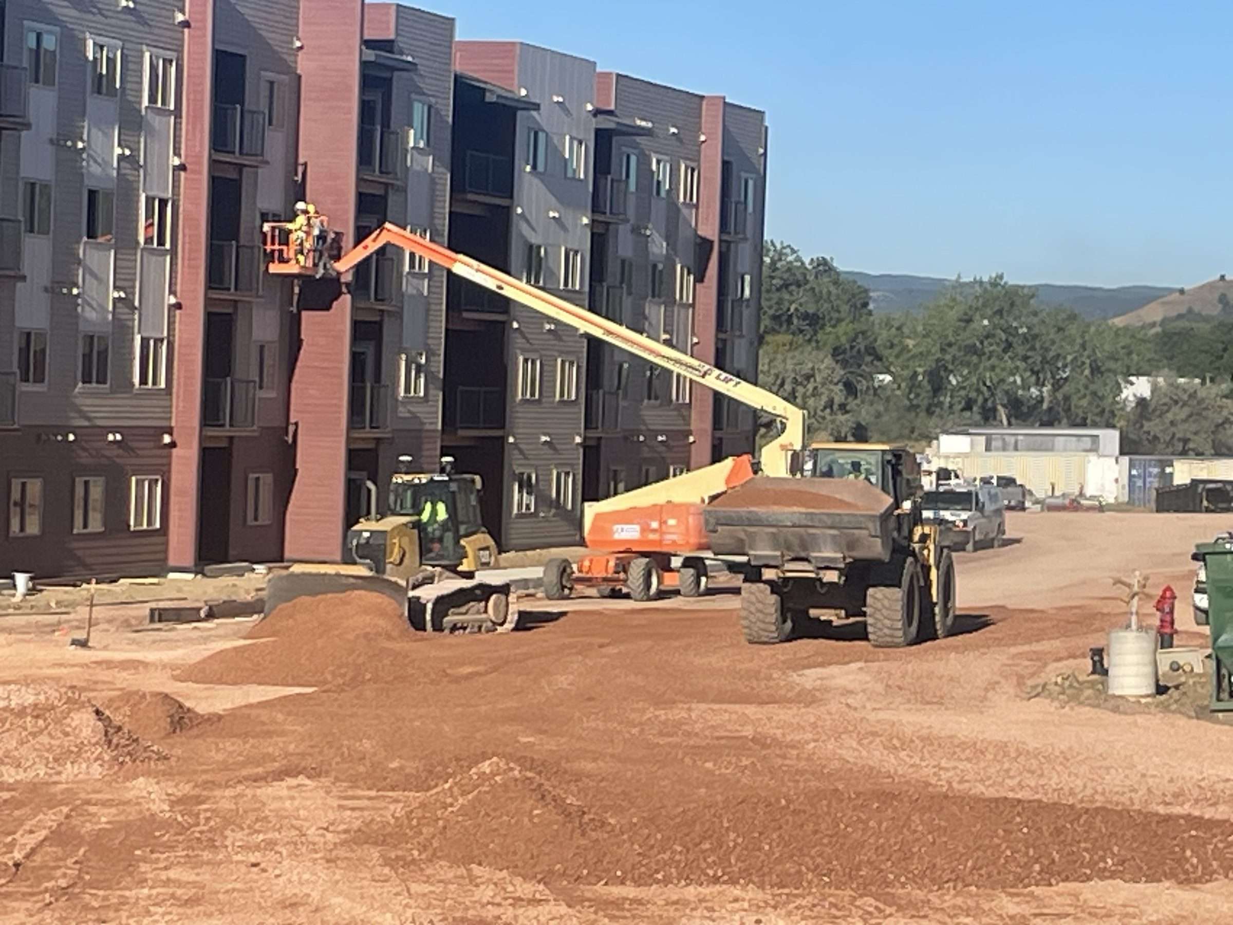 Commercial site being prepared with graded building pads